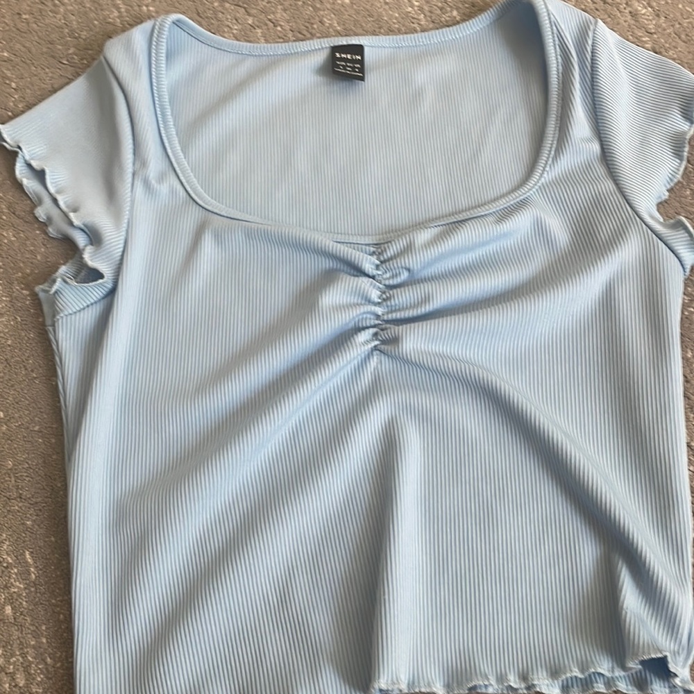 blue shirt
